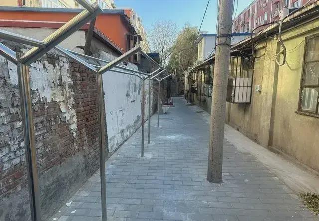 乱建居民想提升小区环境的愿望实现了凯发一触即发拆除700平方米私搭(图5)