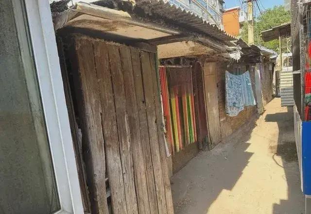 乱建居民想提升小区环境的愿望实现了凯发一触即发拆除700平方米私搭(图8)